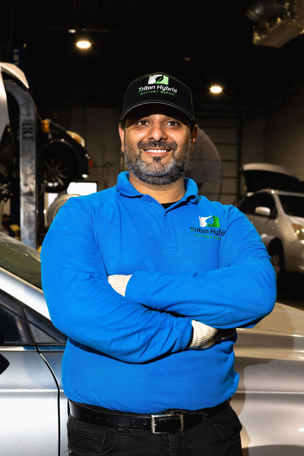 Sal, owner and lead hybrid mechanic at Triton Hybrid Battery Repair, in the Lorton VA shop