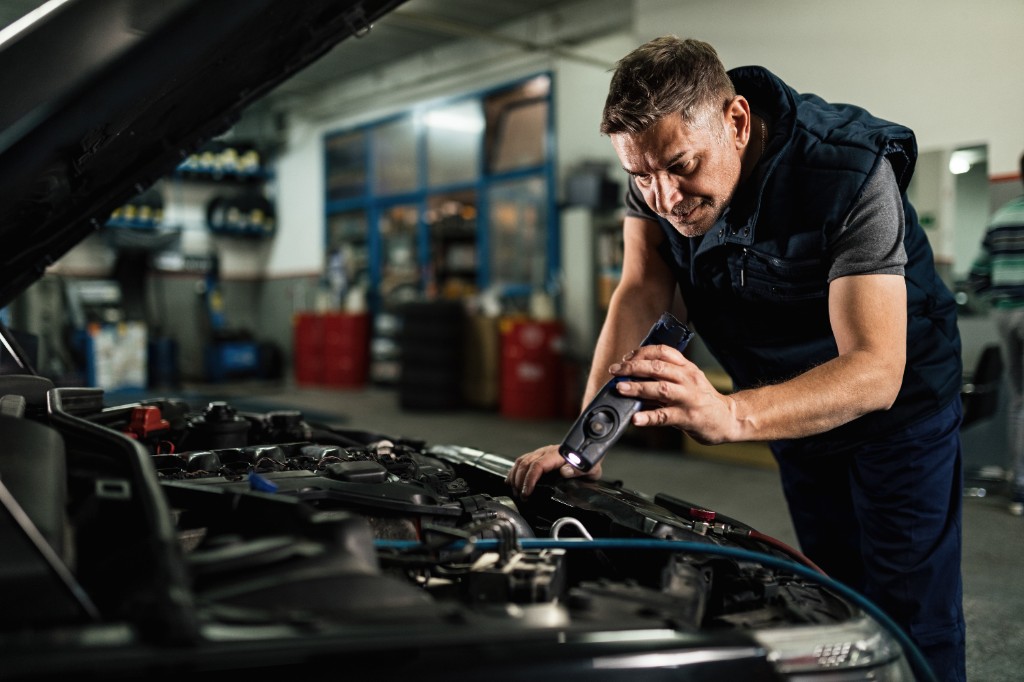 Triton Hybrid technician diagnosing a hybrid battery system
