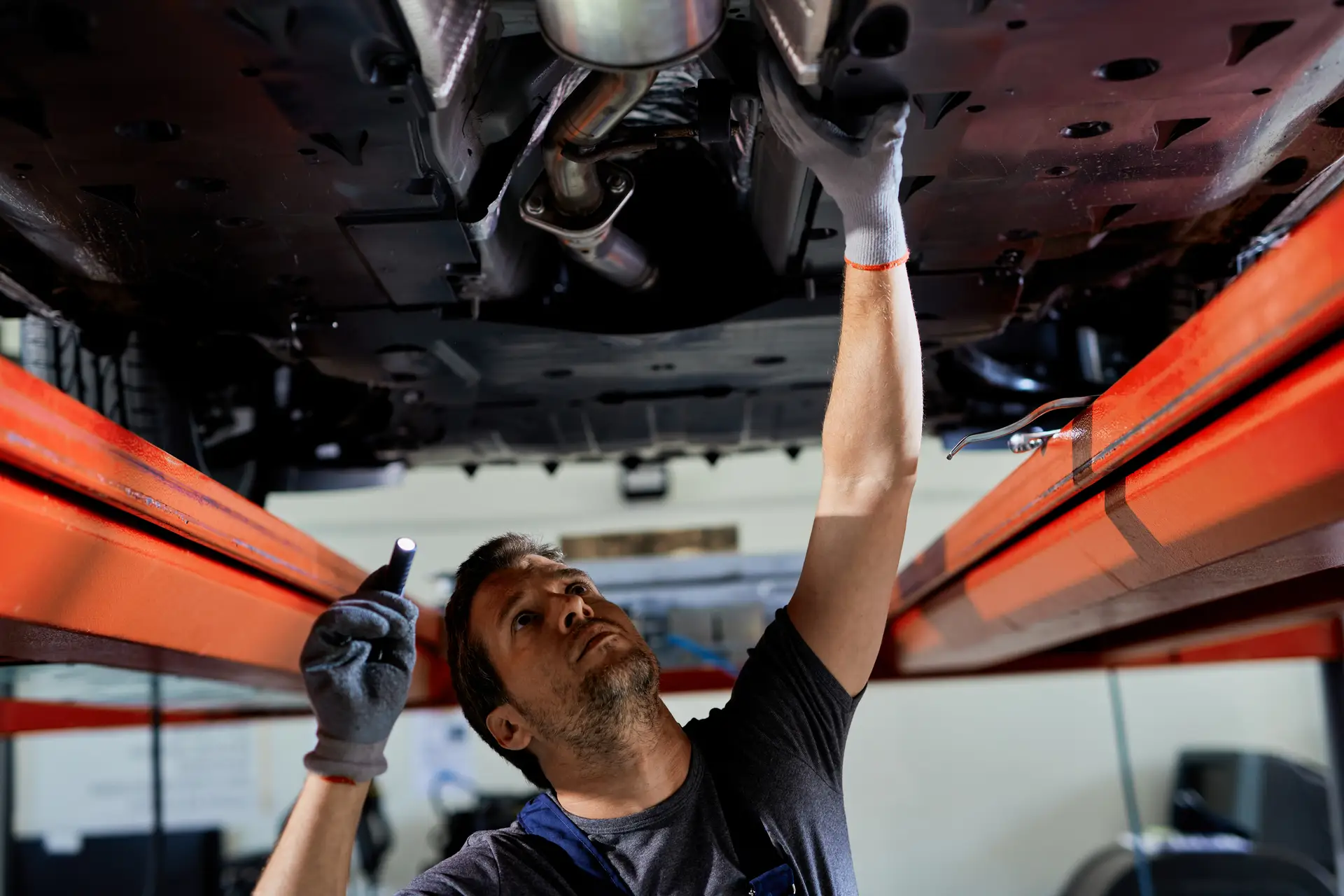 Underside exhaust system inspection on a vehicle lift